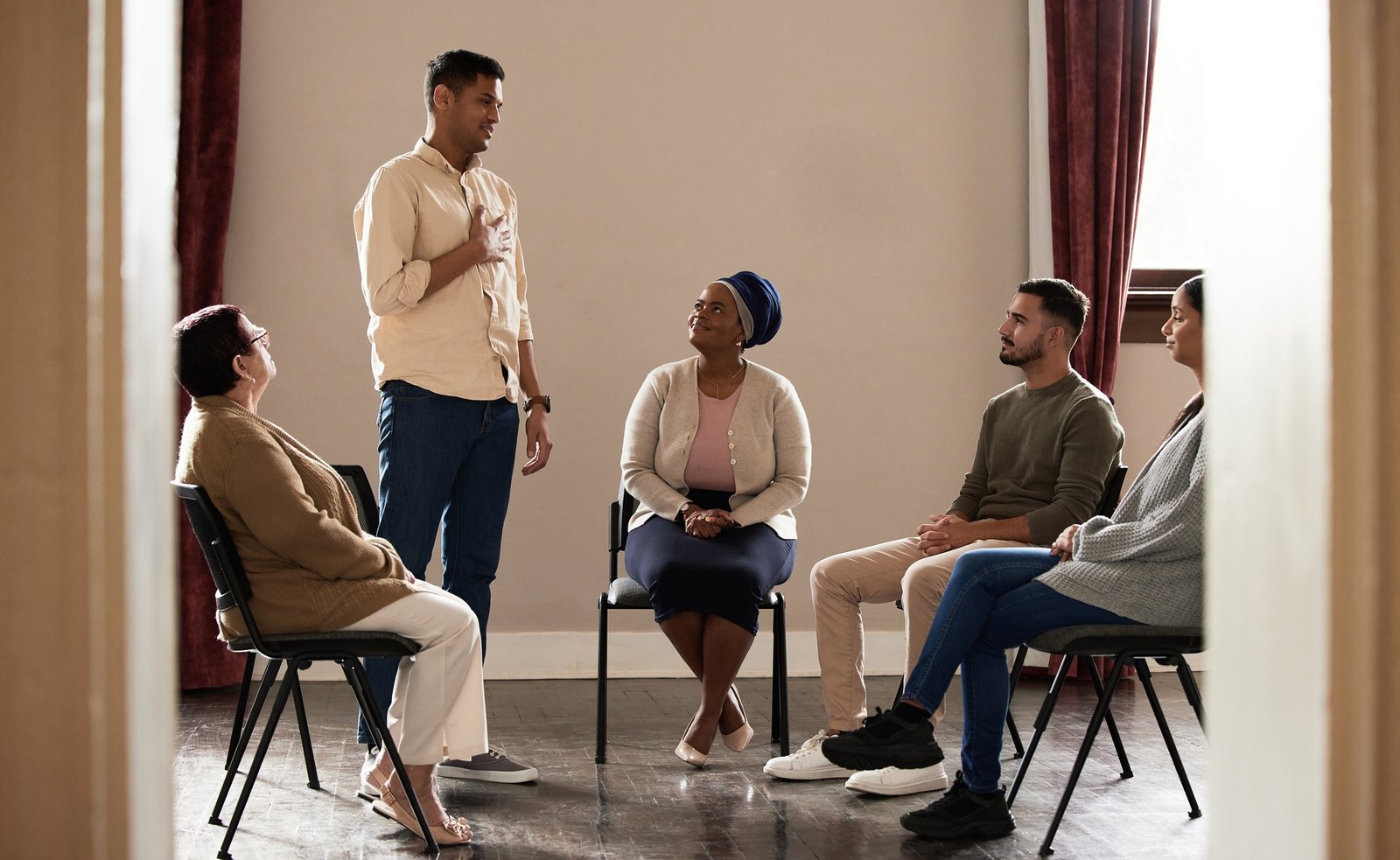 Group therapy, mental help and psychologist support meeting of a sharing circle for drug abuse. Min